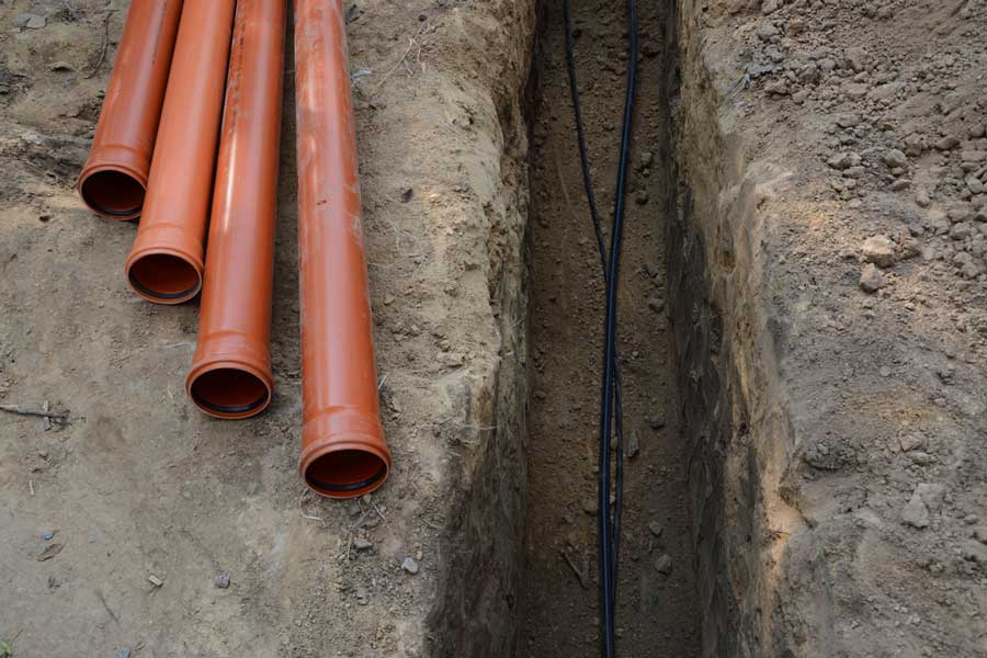 what is a sewer lateral - sewer pipes and cables in trench