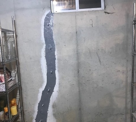 Crack in basement wall repaired - what causes basement flooding