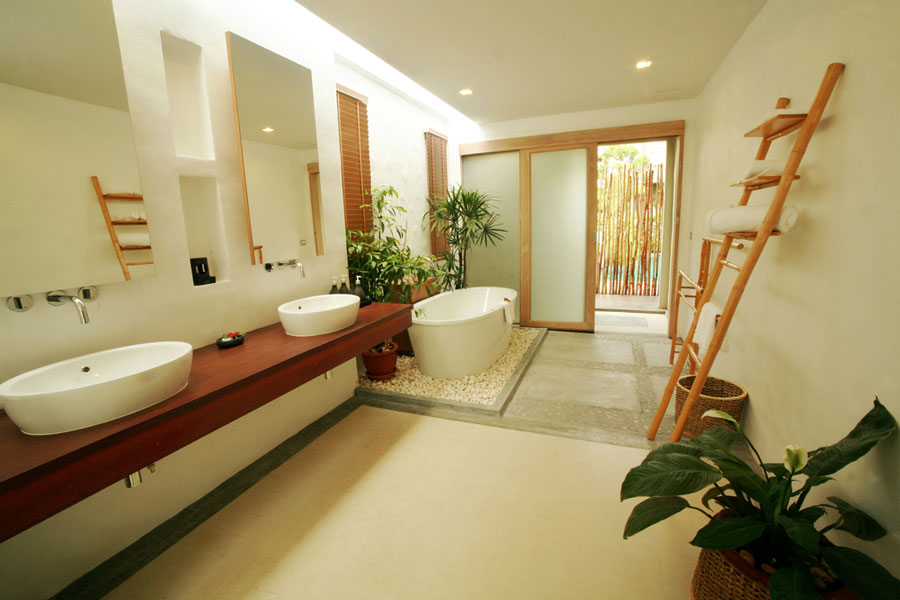 2021 bathroom trends - bathroom with floating vanity green walls freestanding tub