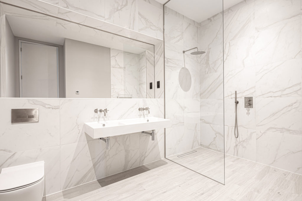 bathroom design - marble and large tiles and floating vanity