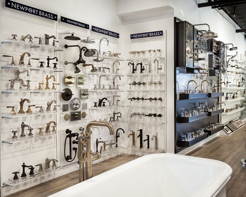 display of hundreds of faucets on walls