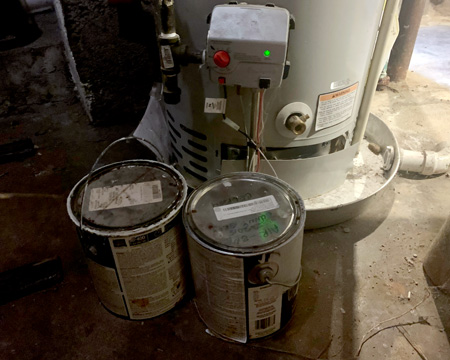 water heater safety - paint cans stored too close to water heater