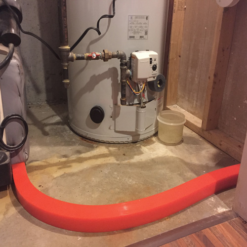 Insta-dam around water heater leak - how to deal with water daamge