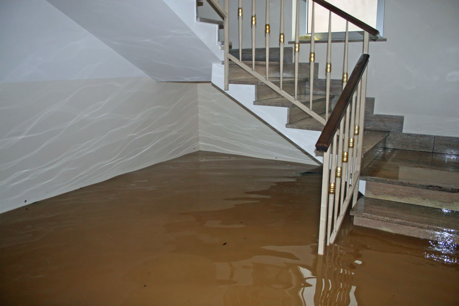 how to minimize flood damage - basement flooded
