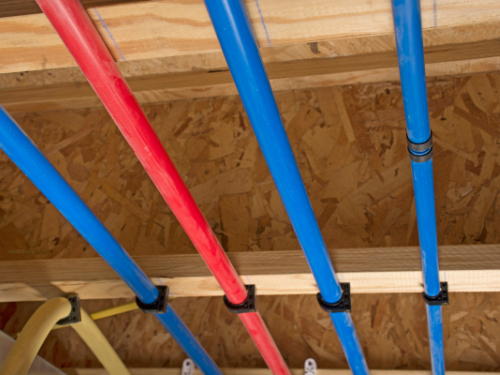 Typically these pipes are found to be blue or gray, but could also be cream or black. If they are exposed on your ceiling like this and are similar to the tips given to identify this type of pipe, they are most likely polybutylene pipes.