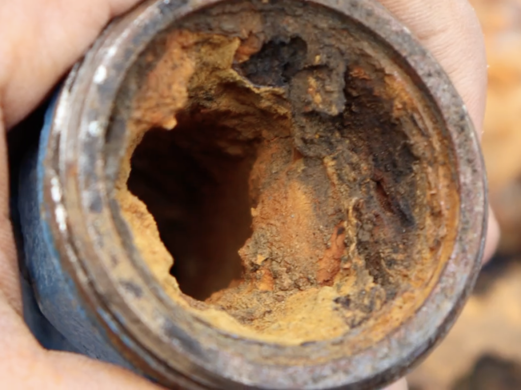 This is what we mean when we say a pipe is "extremely rough" inside. This makes things like toilet paper so easy to cling to the inside of the pipe and clog it, causing a basement floor drain back up.