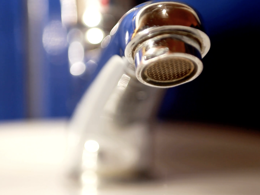 It would be worth your while to invest in faucets with aerators. It's something small, but makes a huge difference!