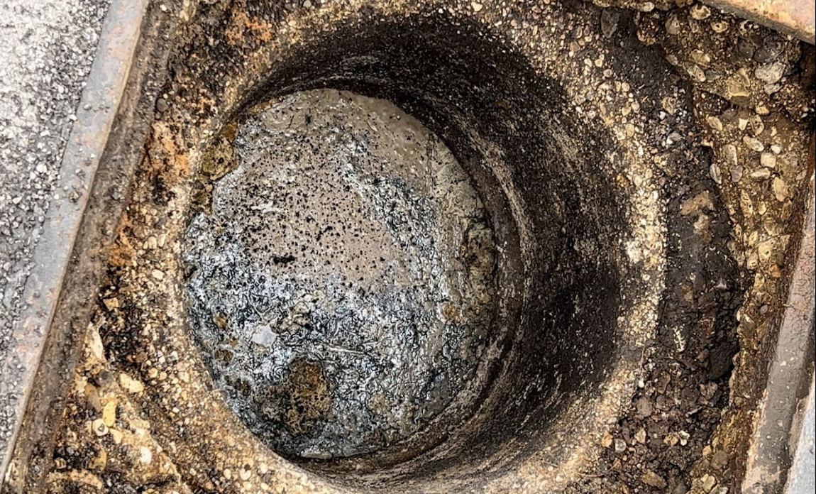 This is what a grease trap looks like after use. You can see why grease is not allowed to flow into the sewer system. It will need to be periodically cleaned to ensure efficiency. 