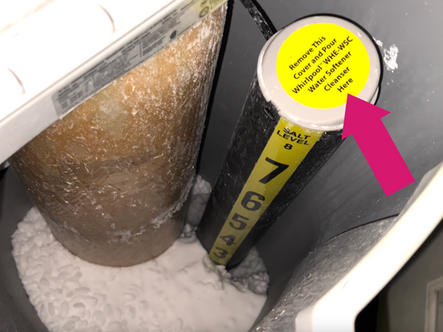 Here is the brine well inside the water softener. You can pour your cleaner directly in to that. 