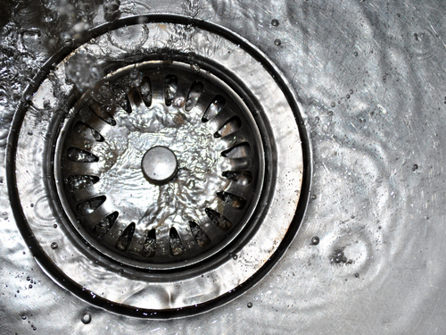 If the leak is coming from the top of the garbage disposal, sometimes the sink drain flange needs to be re-sealed and tightened.