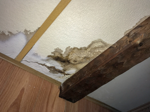 Stains like this one on your ceiling is a sign of a leak. Take care of this immediately.
