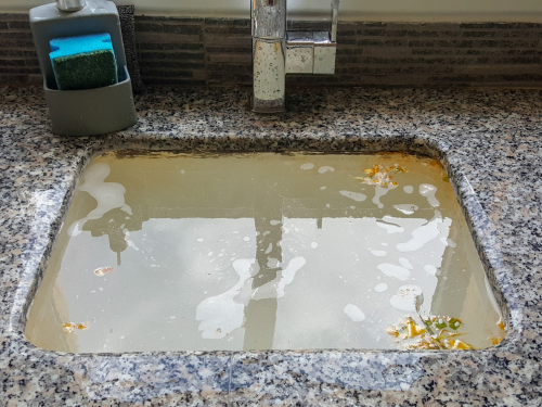 slow draining kitchen sink 