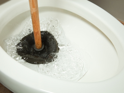 clearing a clog is a good way to stop toilet oveflowing