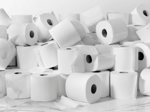 A big pile of toilet paper rolls